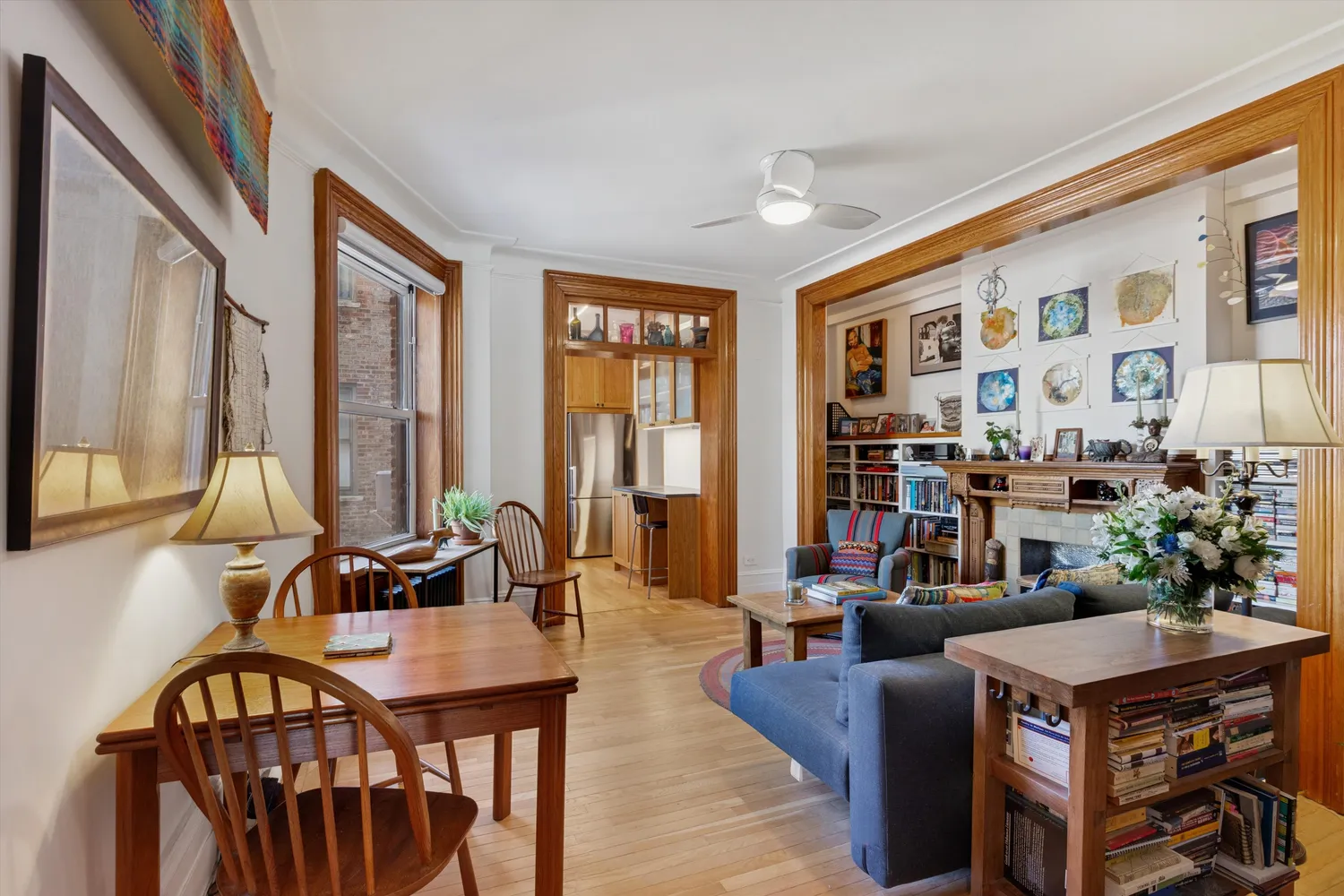 a living room with furniture and large windows