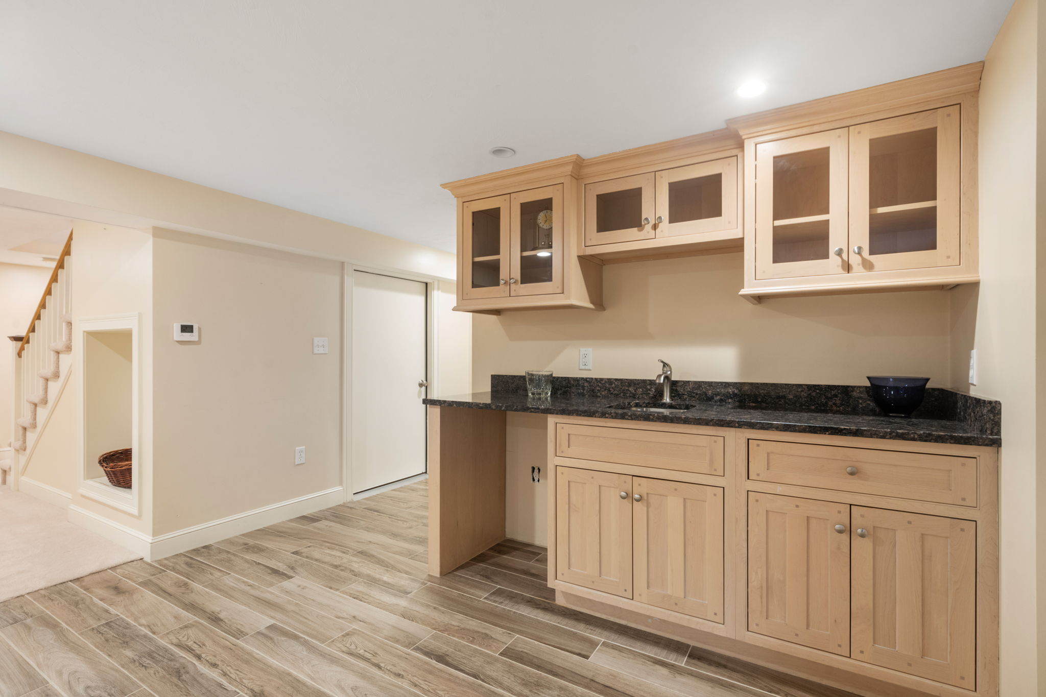 4 Gage Road Wayland, MA 01778 - Photo 24 of 32 a kitchen with granite countertop a sink and cabinets