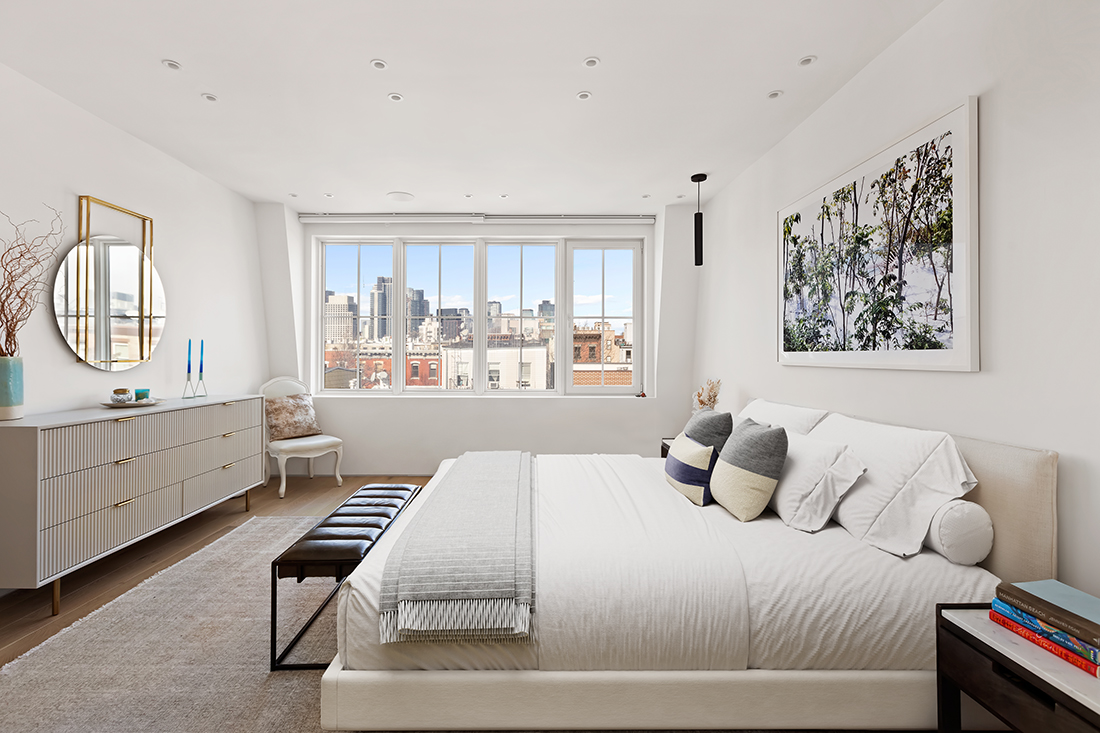 111 Noble Street, Unit 2 Brooklyn, NY 11222 - Photo 6 of 13 a bedroom with a bed and a window