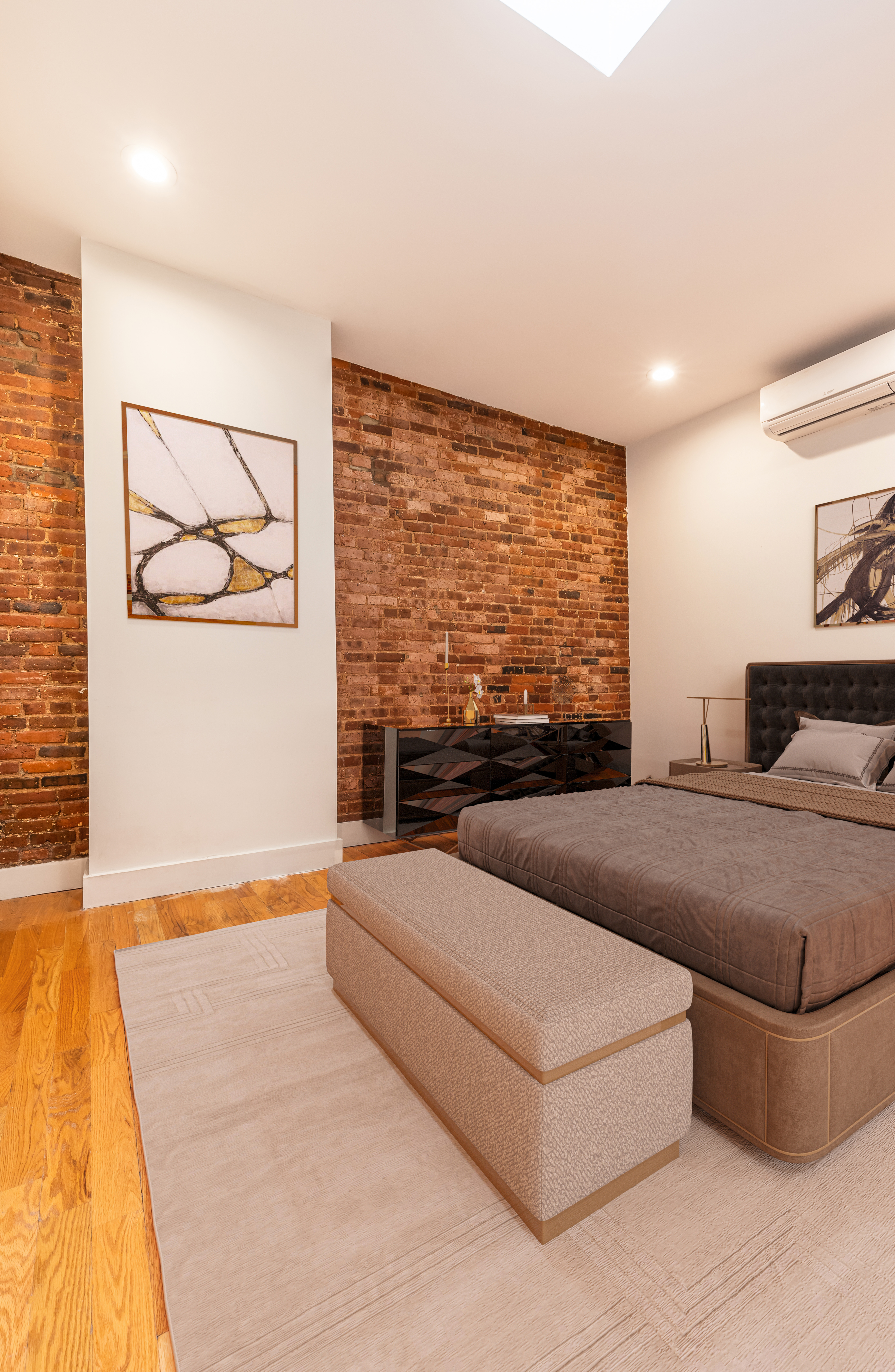 61 Lispenard Street, Unit 4 Manhattan, NY 10013 - Photo 6 of 8 a living room with furniture and a large window
