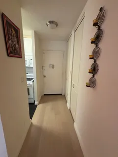 a view of a balcony with couch and door