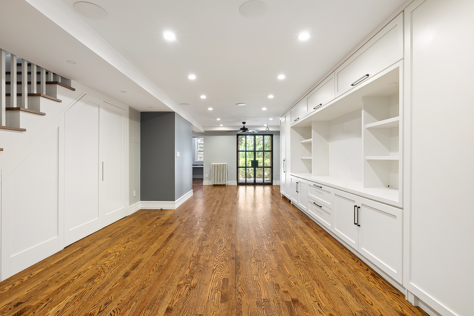 428 5th Street Brooklyn, NY 11215 - Photo 7 of 26 a view of an empty room with wooden floor