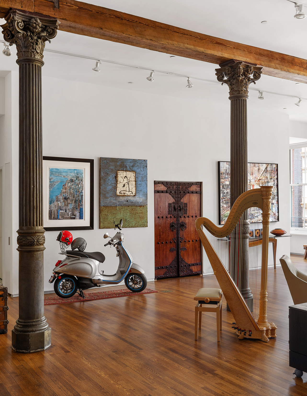 84 Mercer Street, Unit 3E Manhattan, NY 10012 - Photo 5 of 19 a bedroom with furniture and a wooden floor