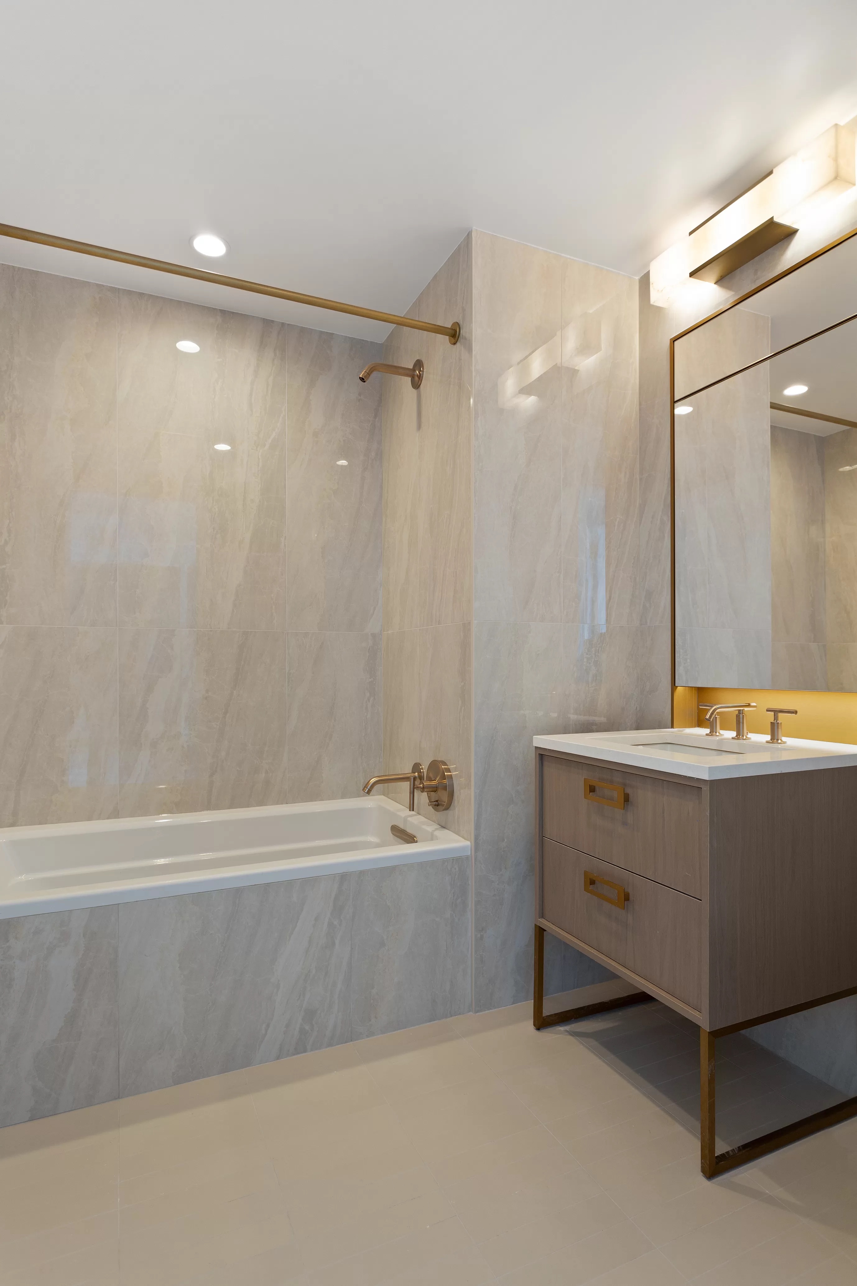 3 Court Square, Unit 3312 Queens, NY 11101 - Photo 5 of 14 a bathroom with a bathtub and a sink