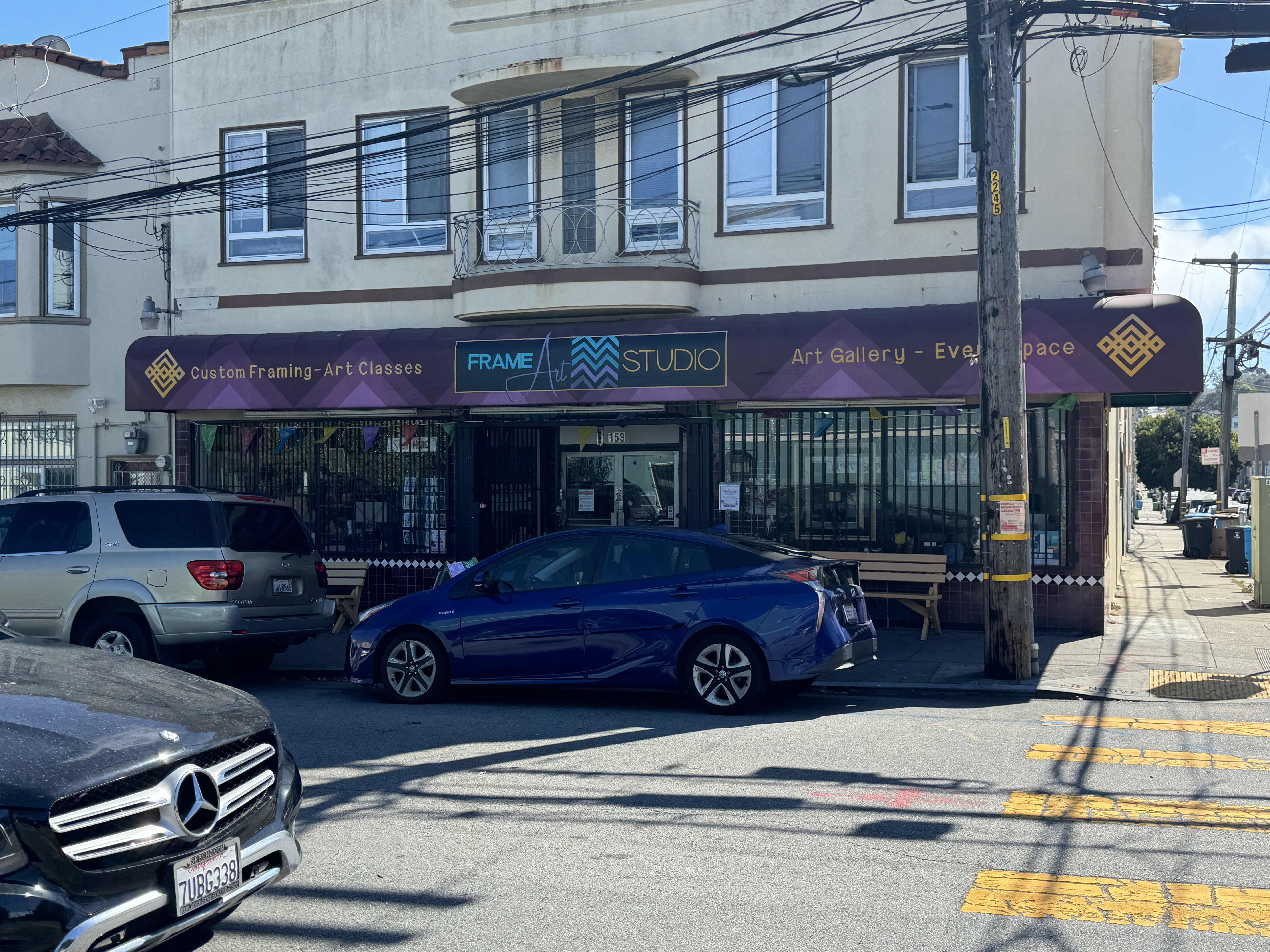 153 Bacon Street San Francisco, CA 94134 - Photo 16 of 26 a car parked in front of a store