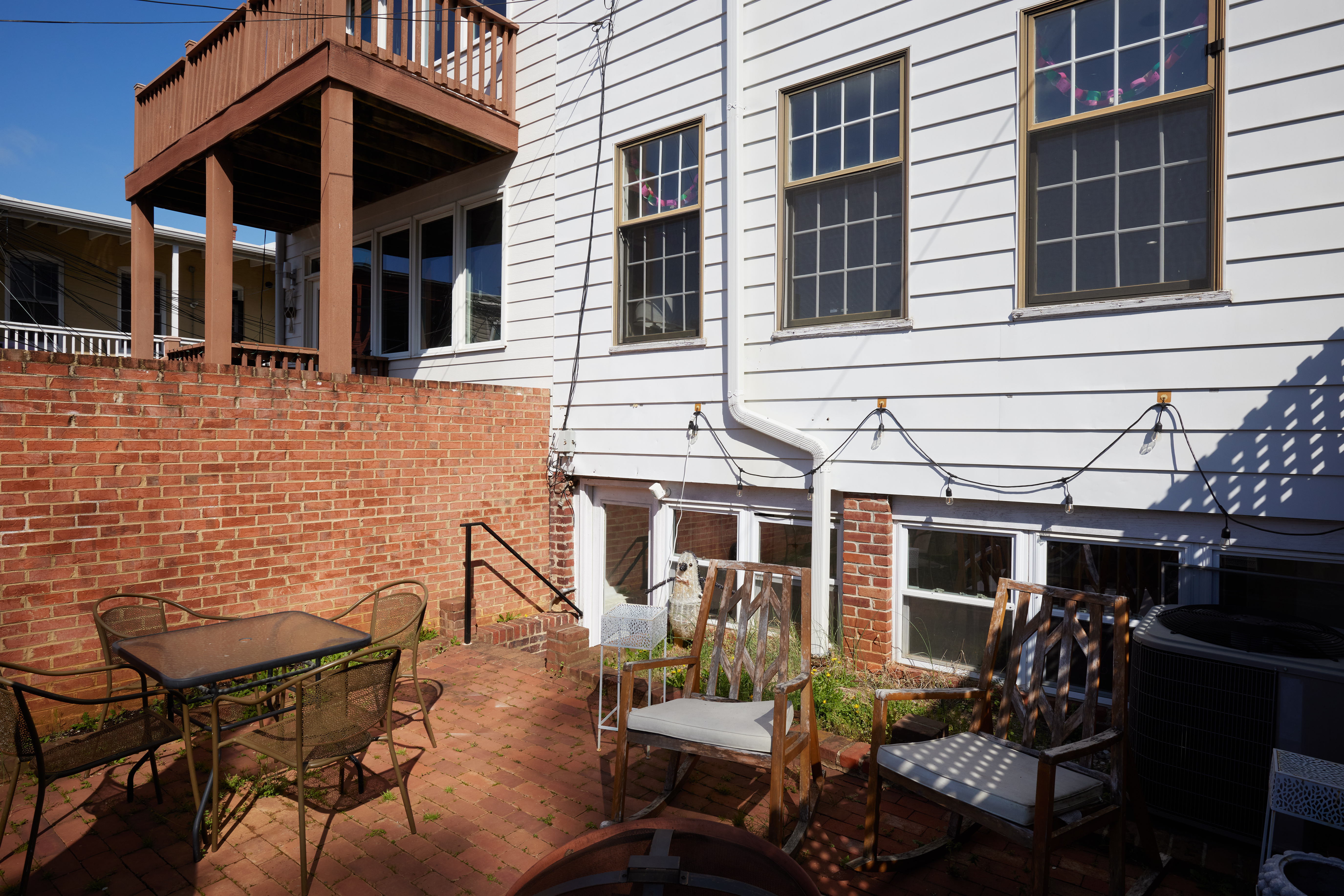 3420 R Street Northwest Washington, DC 20007 - Photo 42 of 53 a view of a chairs and table in the patio