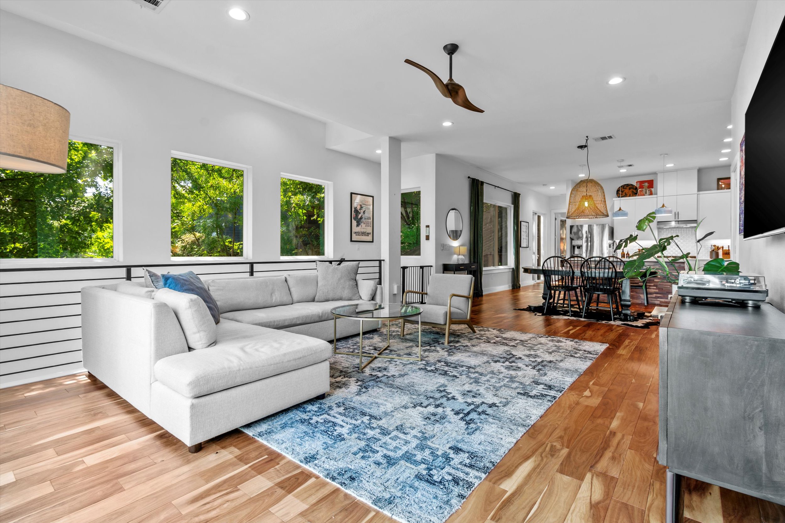 2712 Oak Springs Drive, Unit A Austin, TX 78702 - Photo 23 of 38 a living room with furniture rug and a large window