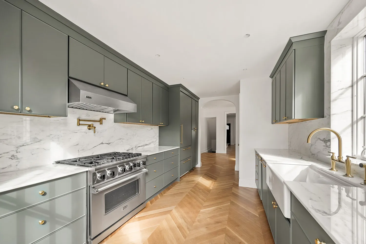 a bedroom with a bed mirror and window