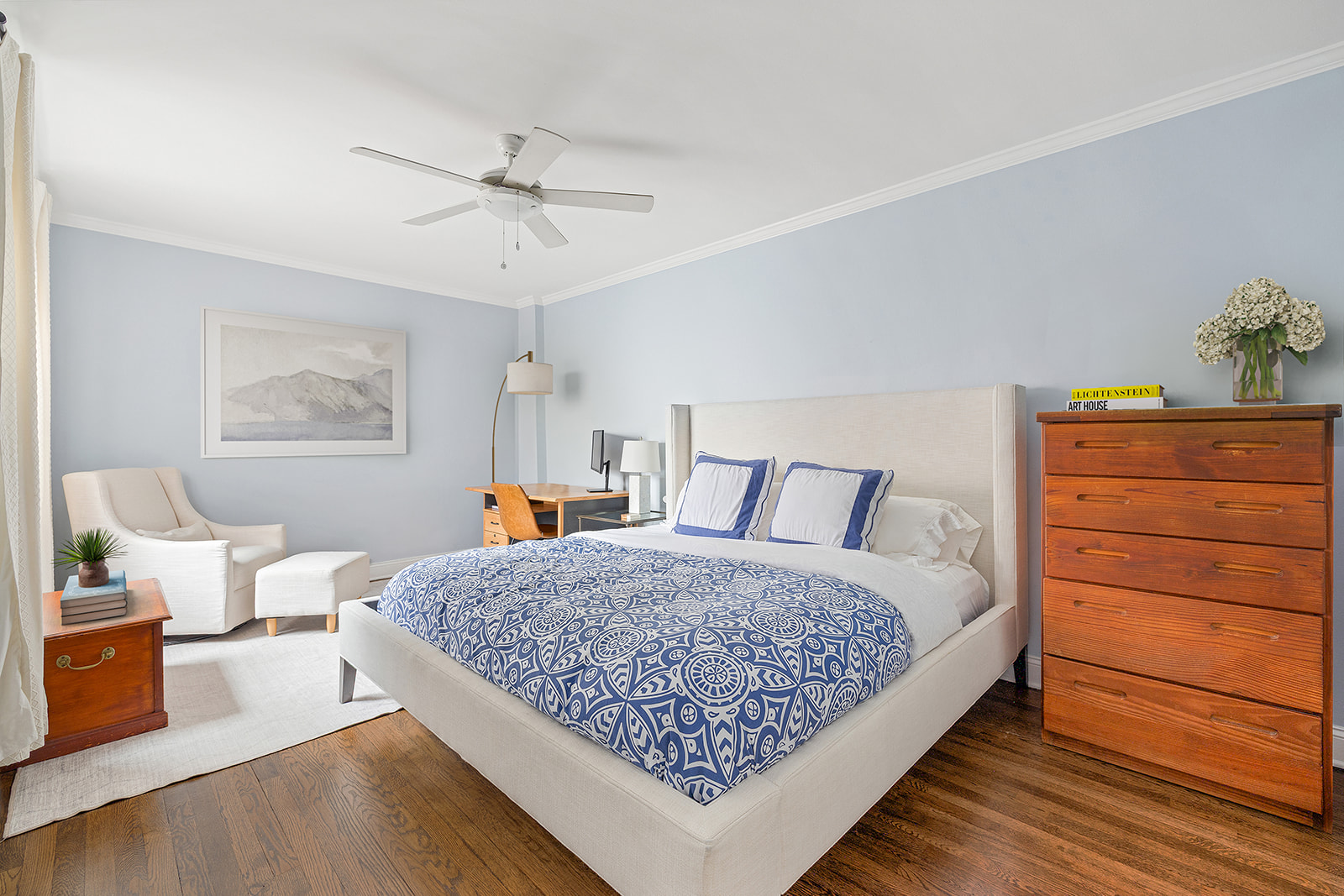 30 East 9th Street, Unit 5M Manhattan, NY 10003 - Photo 8 of 10 a bedroom with a bed and window