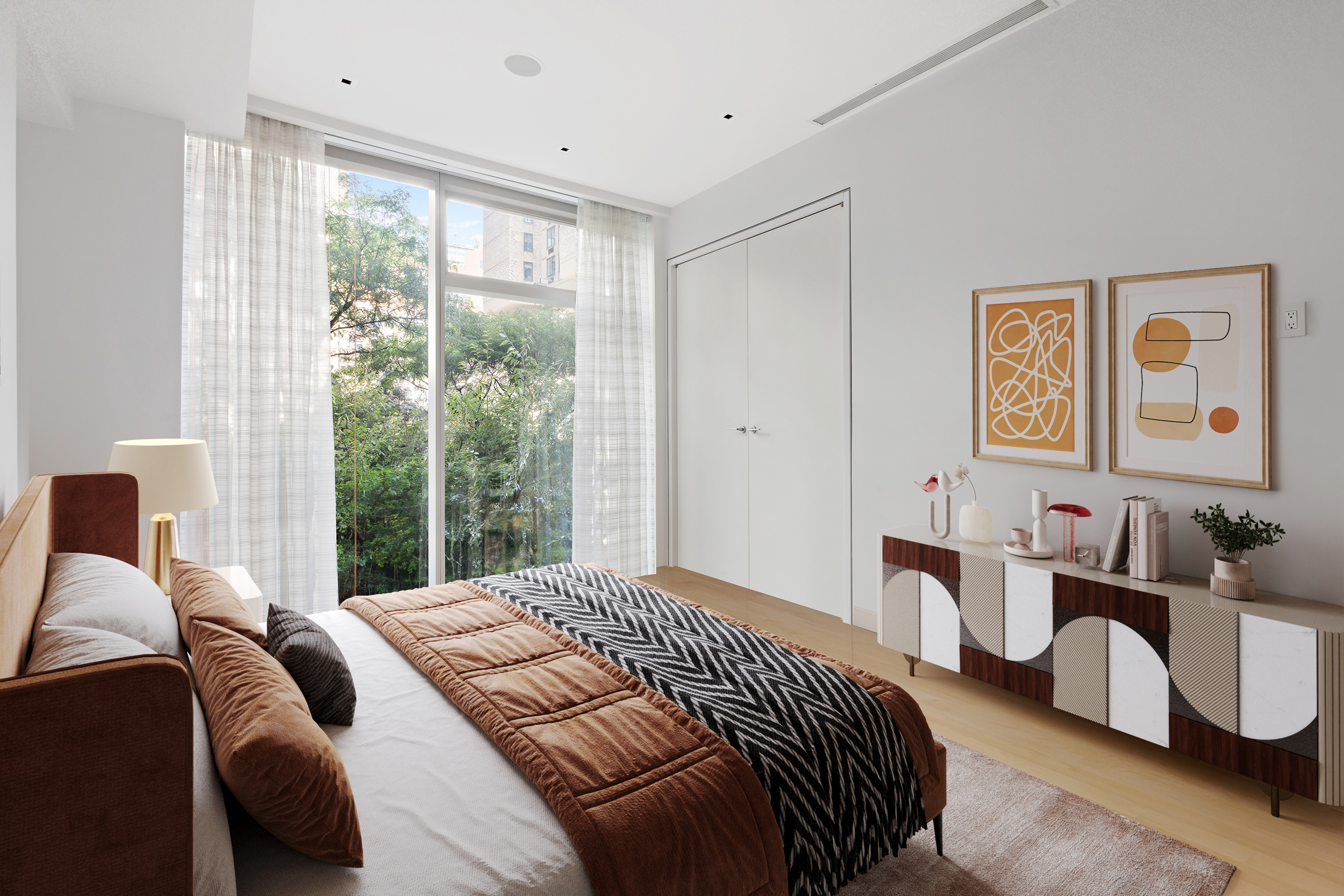 1055 Park Avenue, Unit 1 Manhattan, NY 10028 - Photo 14 of 19 a bedroom with a bed and wooden floor