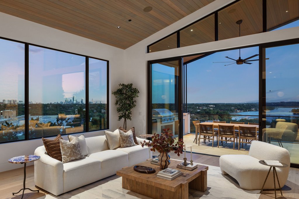 Mt Bonnell Road Austin, TX 78731 - Photo 14 of 51 a living room with furniture and a floor to ceiling window