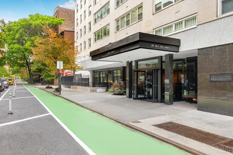 a view of a building with sitting area