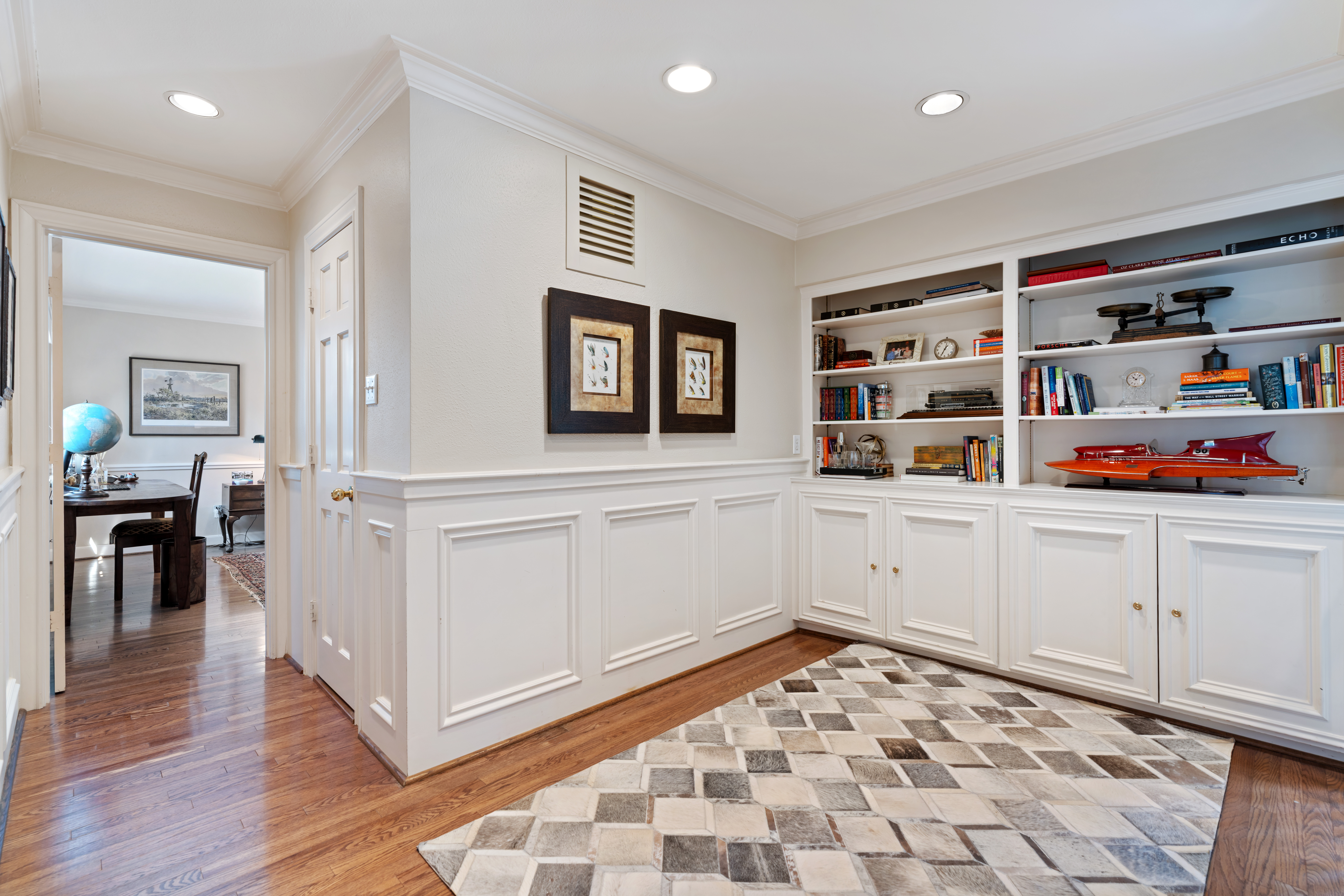 711 Pifer Road Houston, TX 77024 - Photo 33 of 53 a workspace with white cabinets