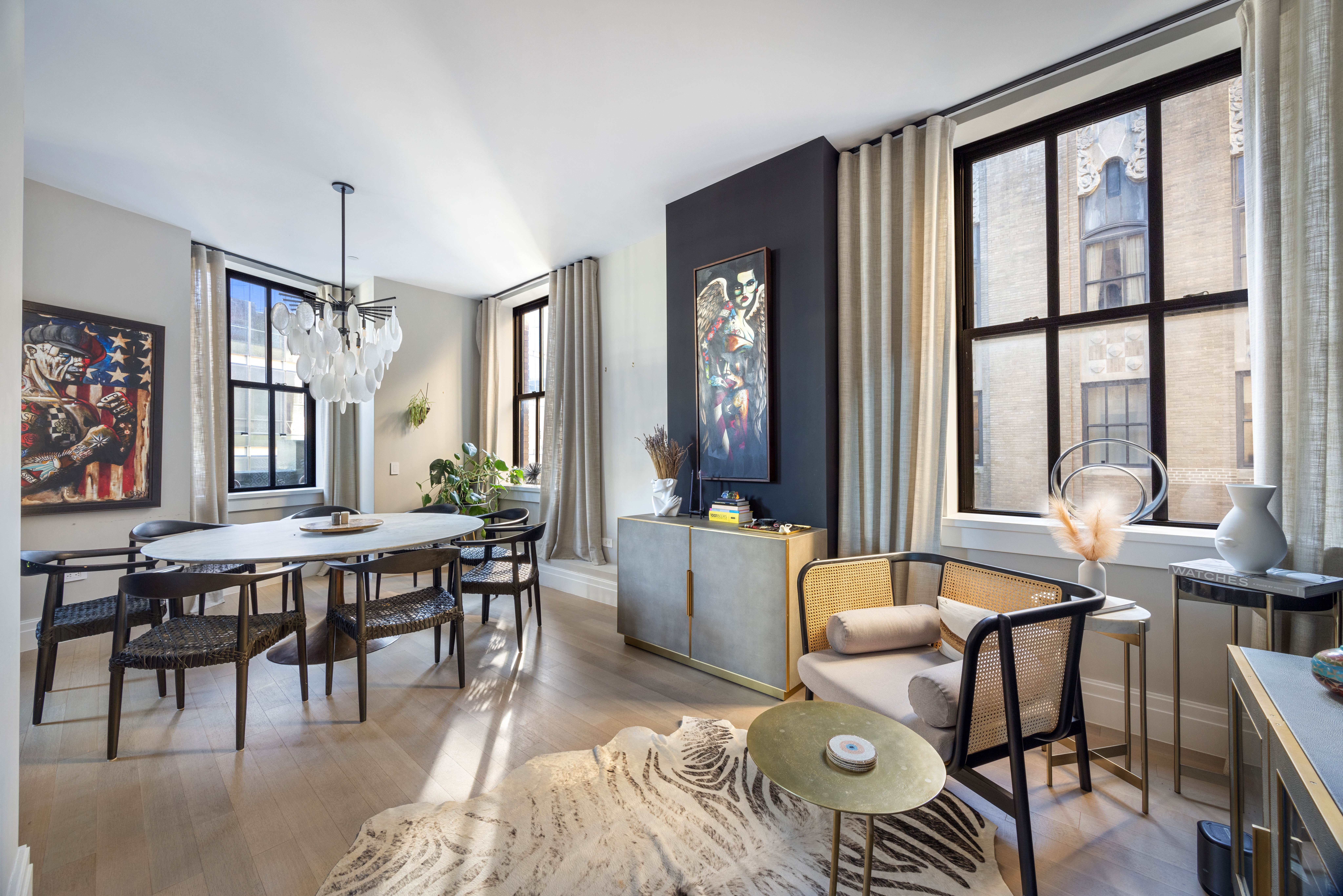 100 Barclay Street, Unit 16G Manhattan, NY 10007 - Photo 6 of 28 a living room with furniture and wooden floor