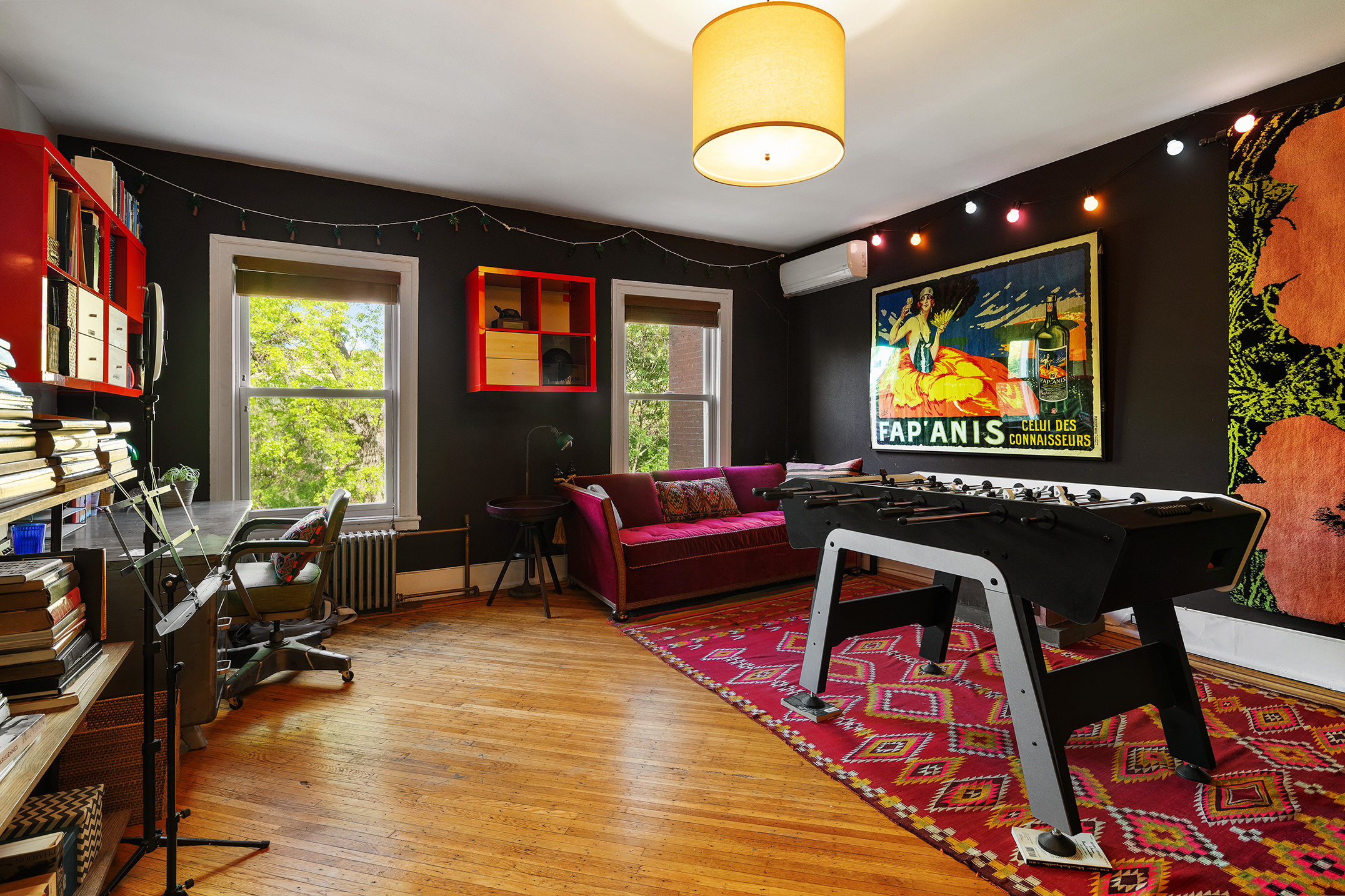 264 Clinton Avenue Brooklyn, NY 11205 - Photo 13 of 21 a living room with furniture and a flat screen tv