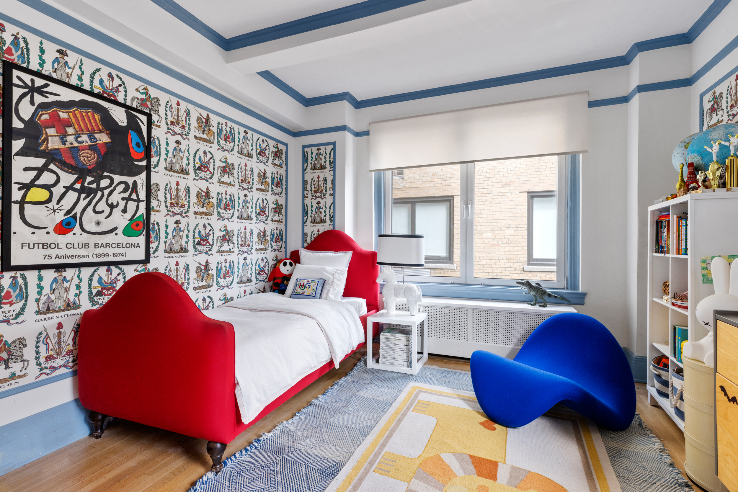 38 East 85th Street, Unit 10E Manhattan, NY 10028 - Photo 8 of 14 a bedroom with a bed and a painting on the wall