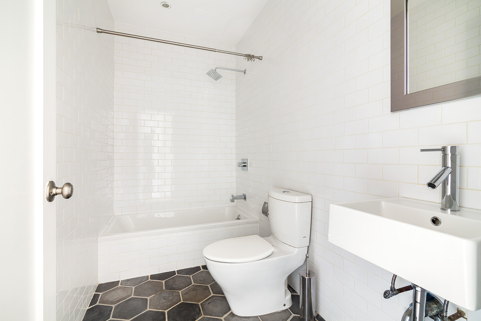 356 Halsey Street, Unit 2 Brooklyn, NY 11216 - Photo 7 of 9 a bathroom with a sink a toilet and shower
