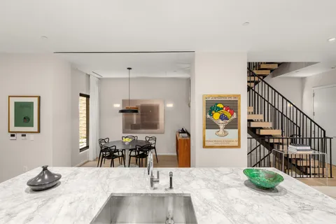 a living room with furniture and flat screen tv