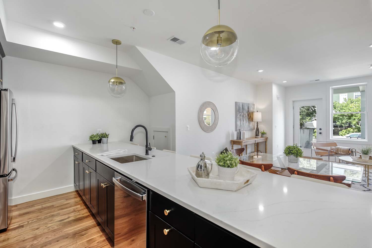 428 Manor Place Northwest, Unit 1 Washington, DC 20010 - Photo 8 of 27 a kitchen with a sink and a stove top oven