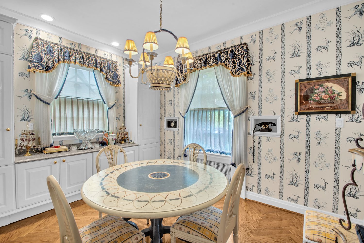 a dining room with furniture and window