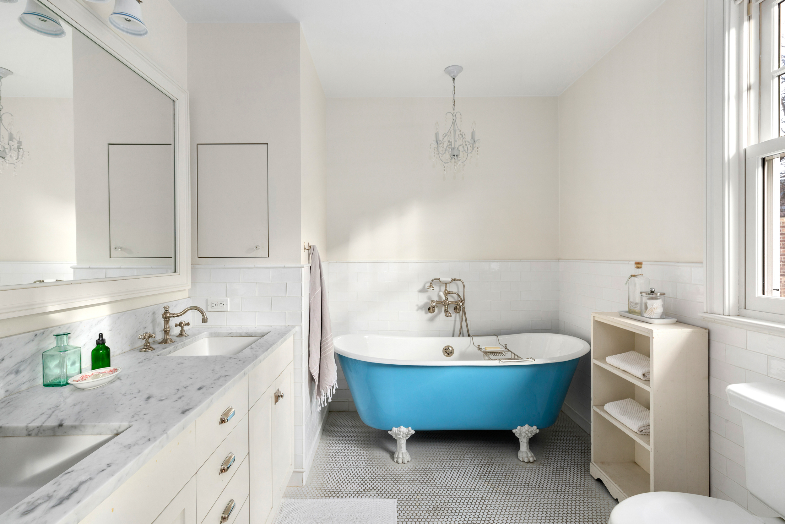 200 Fenimore Street Brooklyn, NY 11225 - Photo 16 of 24 a spacious bathroom with a bathtub sink and mirror