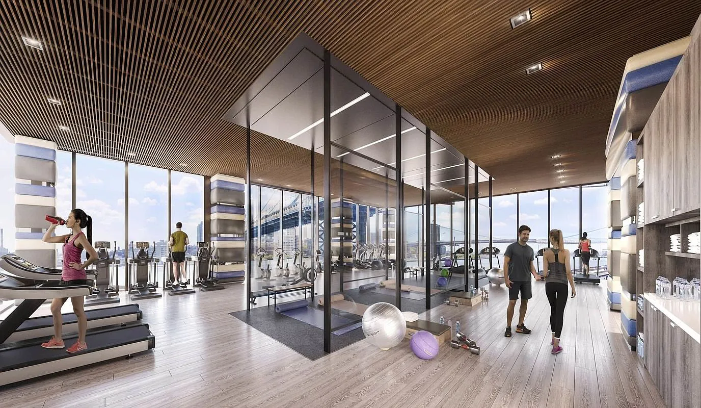 252 South Street, Unit 52J Manhattan, NY 10002 - Photo 8 of 17 a view of a room with gym equipment