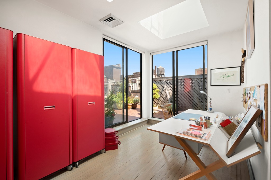 205 West 89th Street, Unit PH6/7 Manhattan, NY 10024 - Photo 13 of 20 a bedroom with a bed and large windows