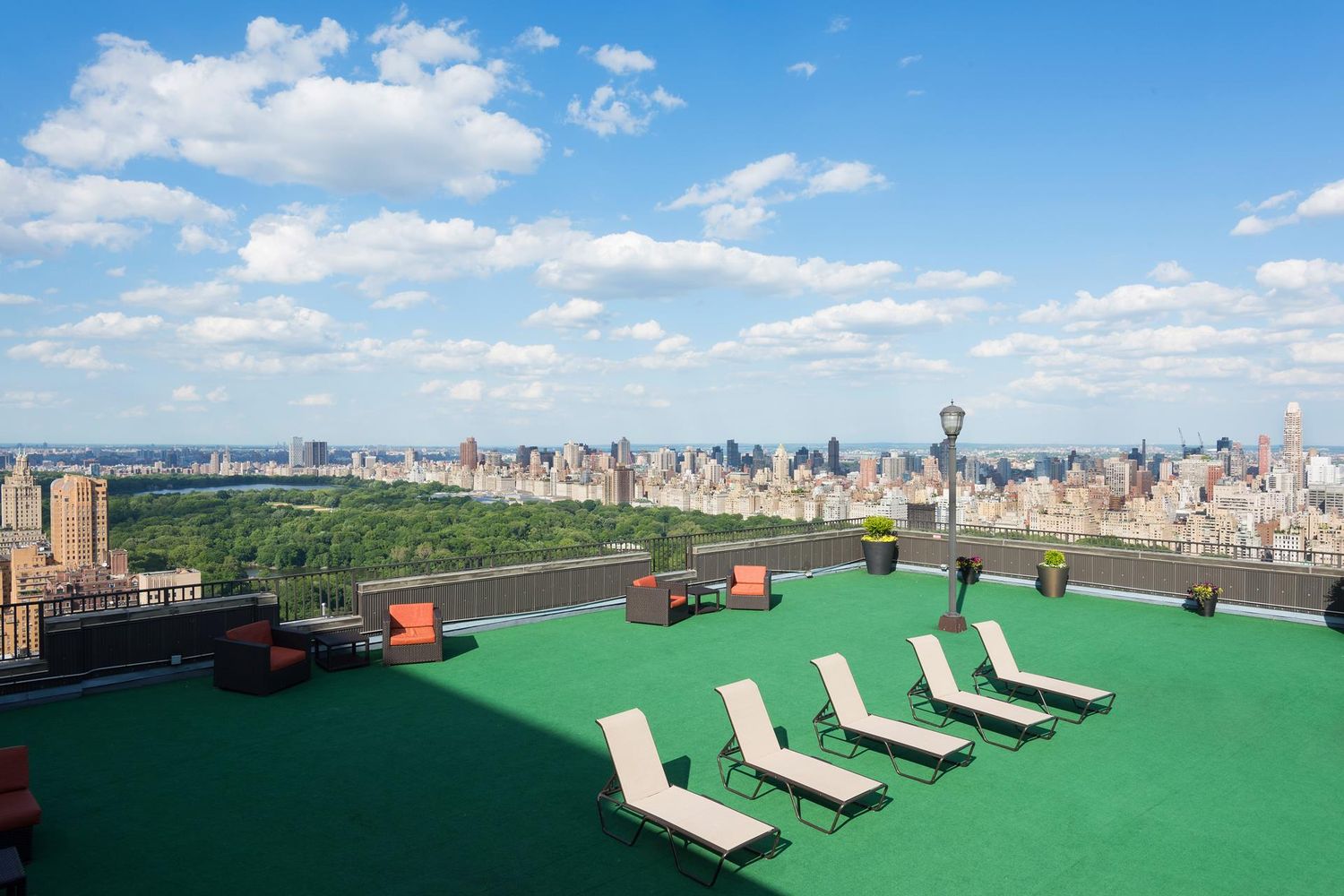 20 West 64th Street, Unit 20K Manhattan, NY 10023 - Photo 14 of 17 a view of a garden with lawn chairs