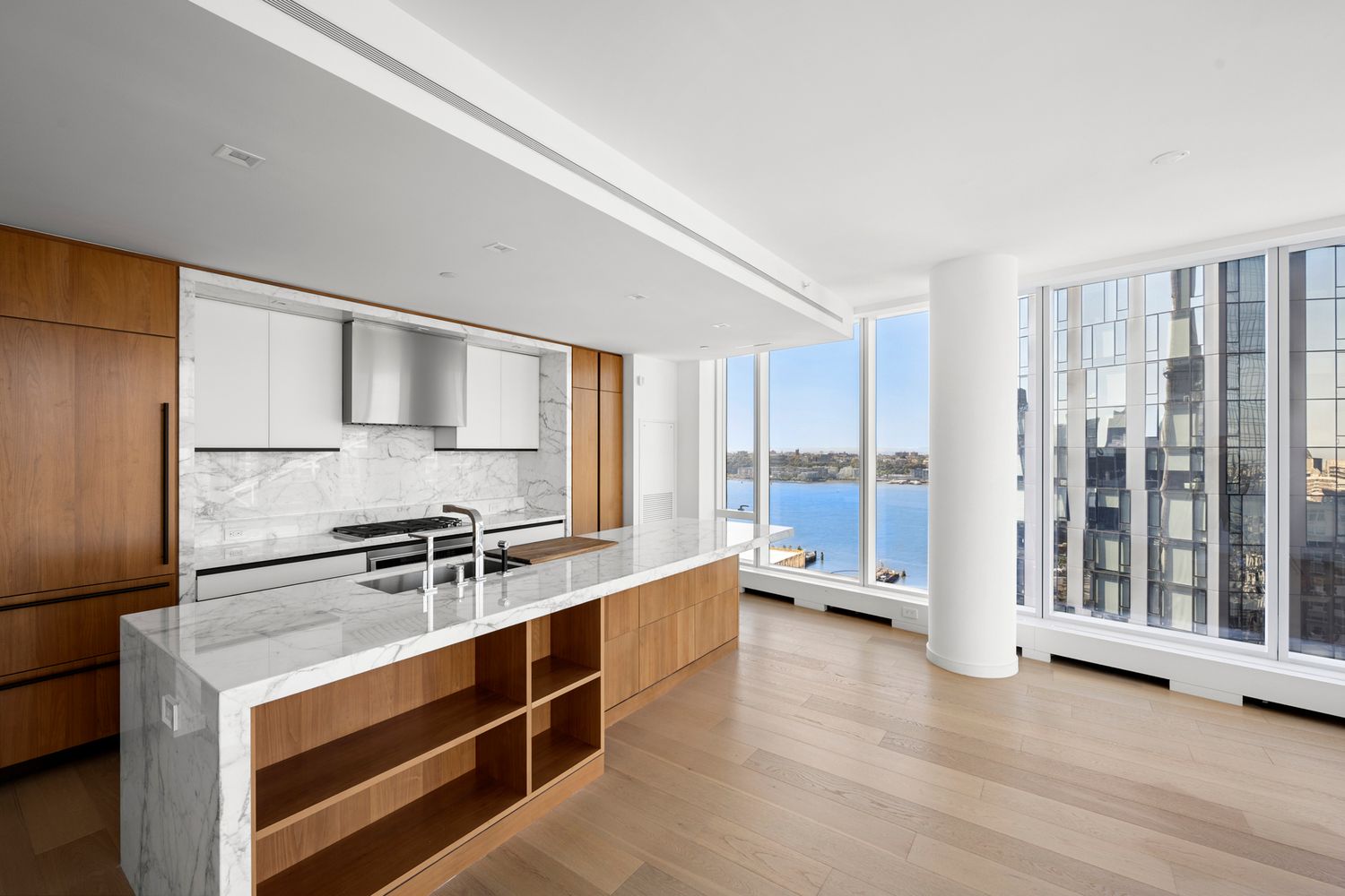 a view of a kitchen with a sink and a window