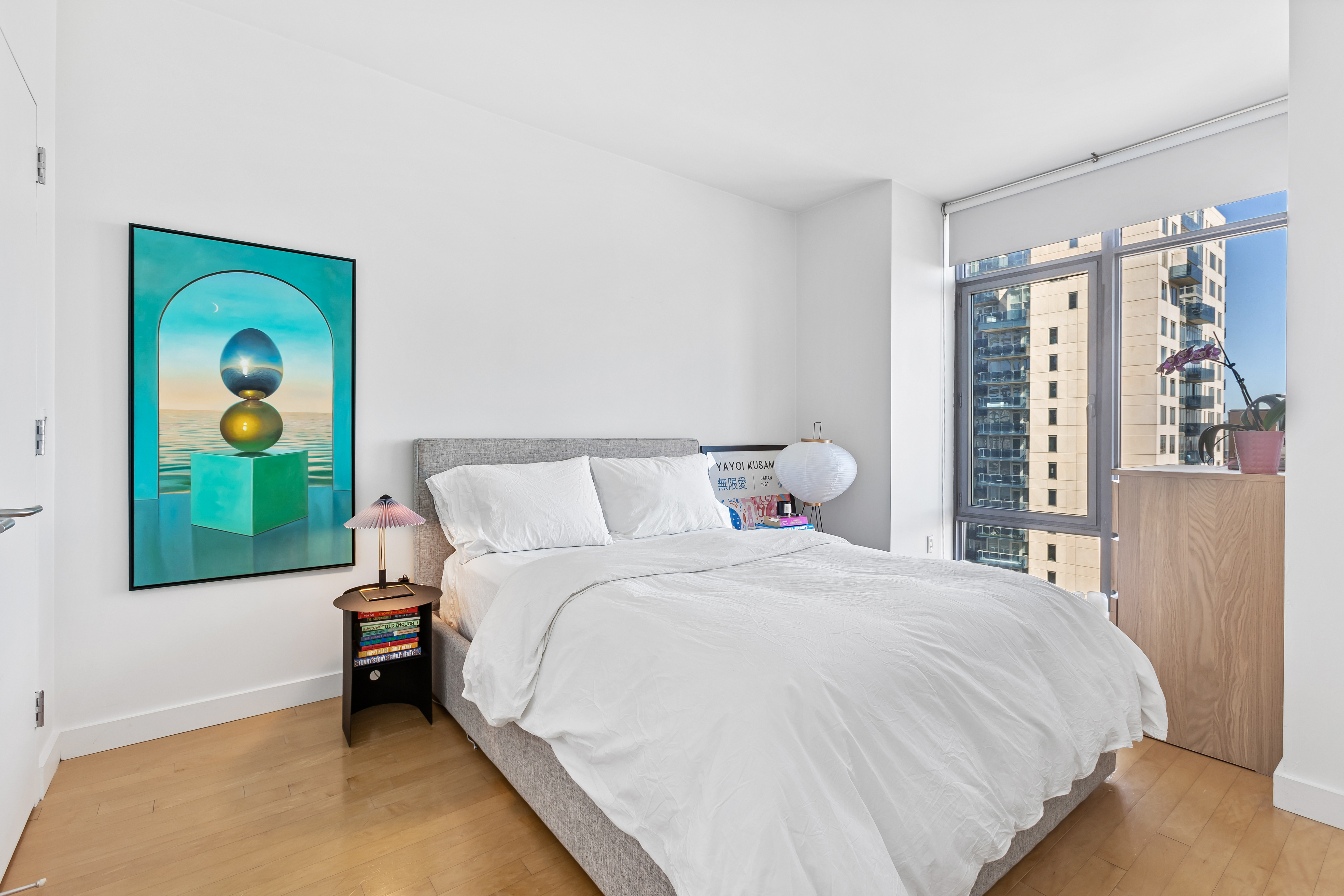 1 Northside Piers, Unit 23A Brooklyn, NY 11249 - Photo 3 of 5 a bedroom with a bed and a window