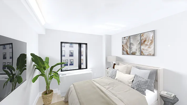 605 Hart Street, Unit 6E Brooklyn, NY 11221 - Photo 4 of 10 a living room with furniture potted plant and a window