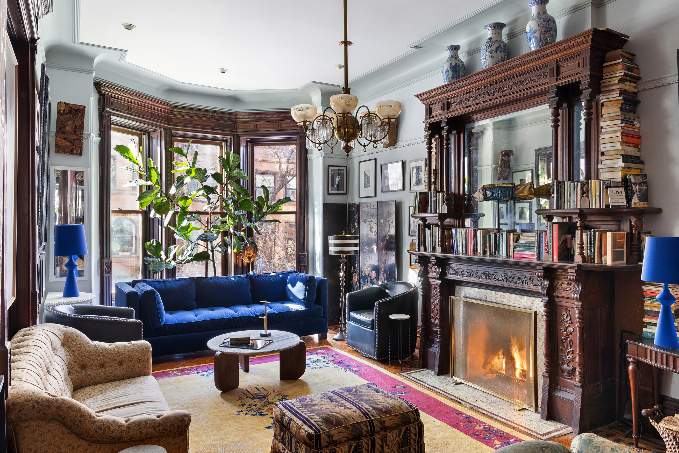 57 Montgomery Place Brooklyn, NY 11215 - Photo 1 of 6 a living room with furniture and a fireplace
