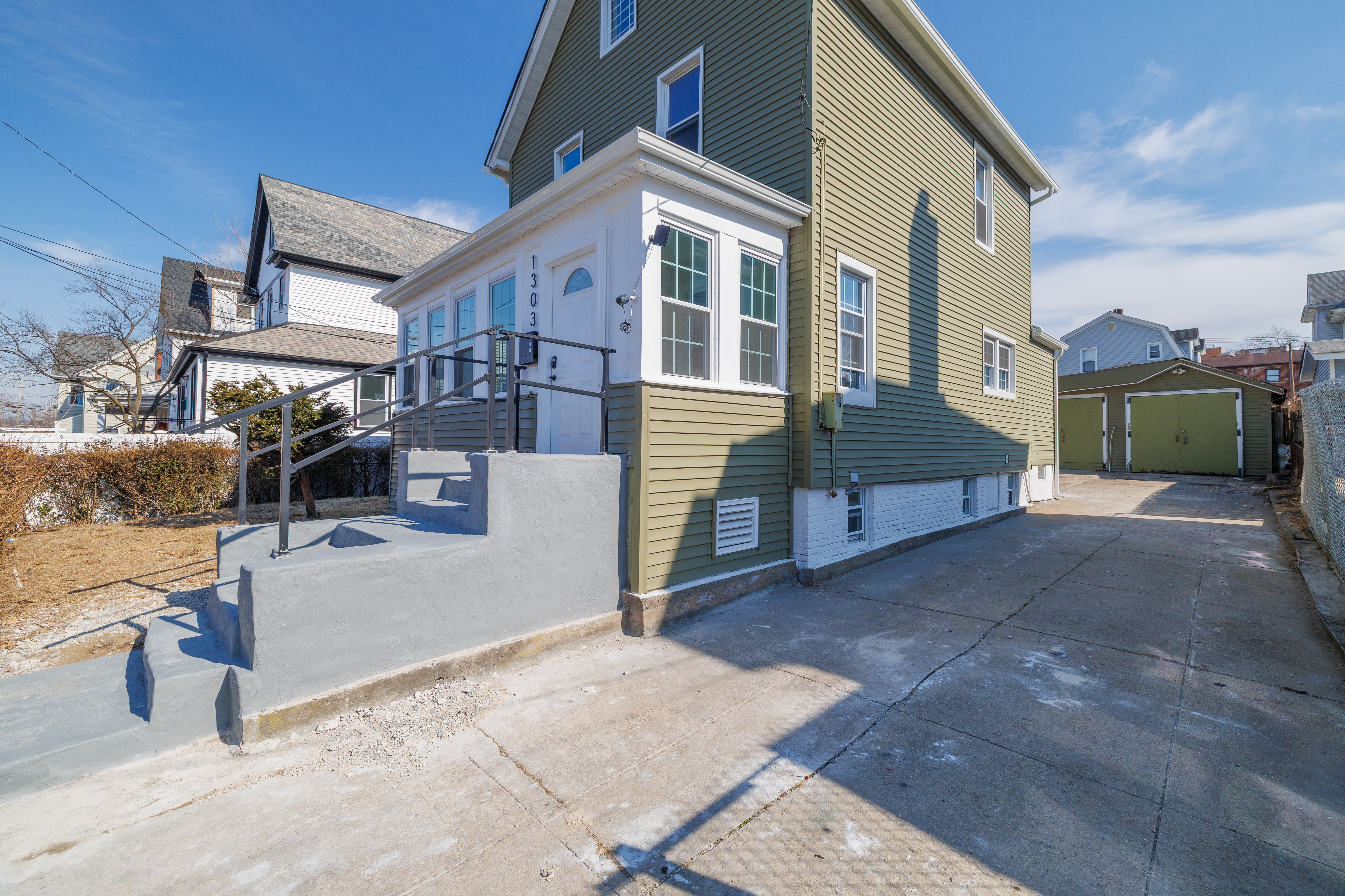 13-03 Brunswick Avenue Queens, NY 11691 - Photo 24 of 27 a view of a house with a patio