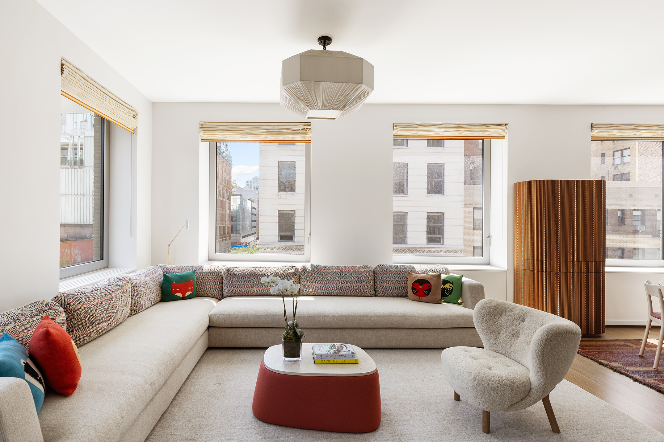 116 University Place, Unit 5 Manhattan, NY 10003 - Photo 3 of 19 a living room with furniture and a large window