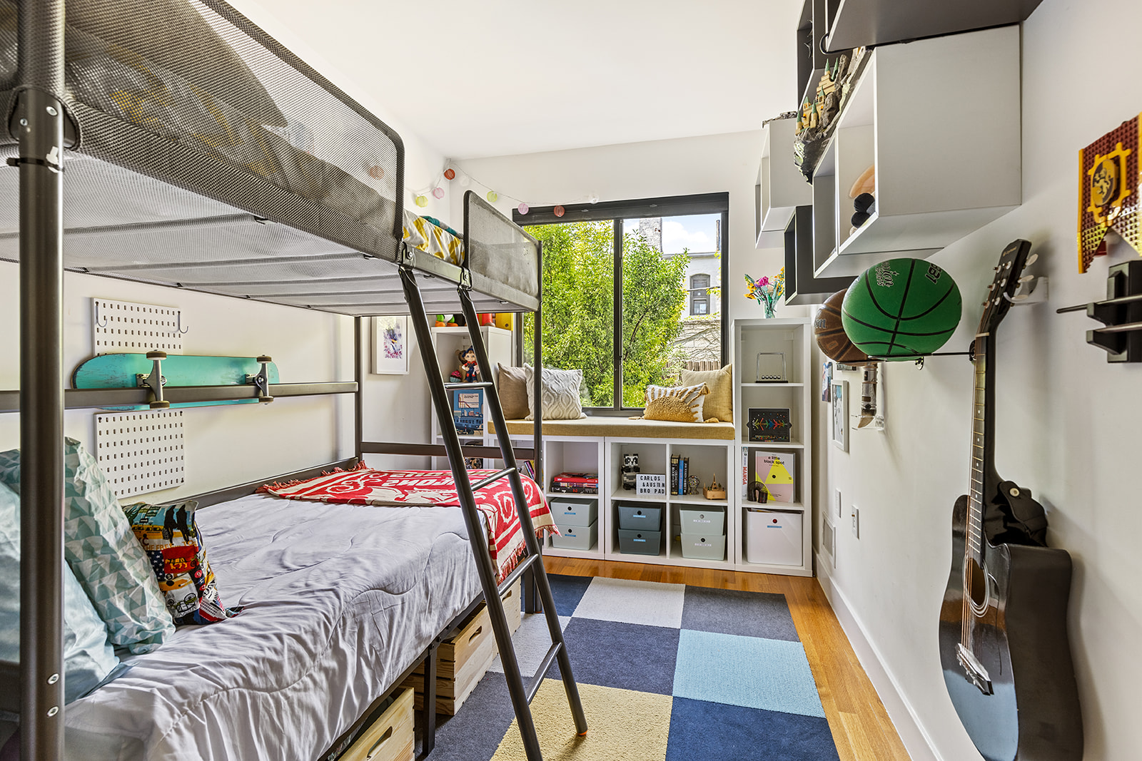 495 Rutland Road, Unit 1 Brooklyn, NY 11203 - Photo 6 of 13 a bedroom with furniture and a large window