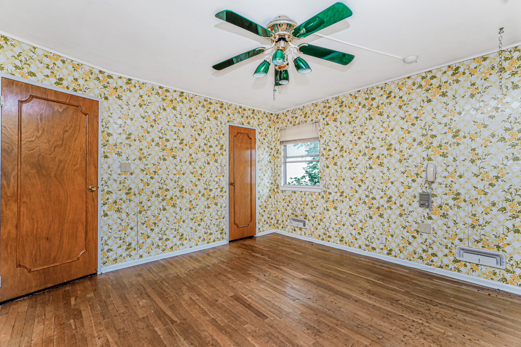461 Mayfair Drive South Brooklyn, NY 11234 - Photo 15 of 30 wooden floor in an empty room with a window