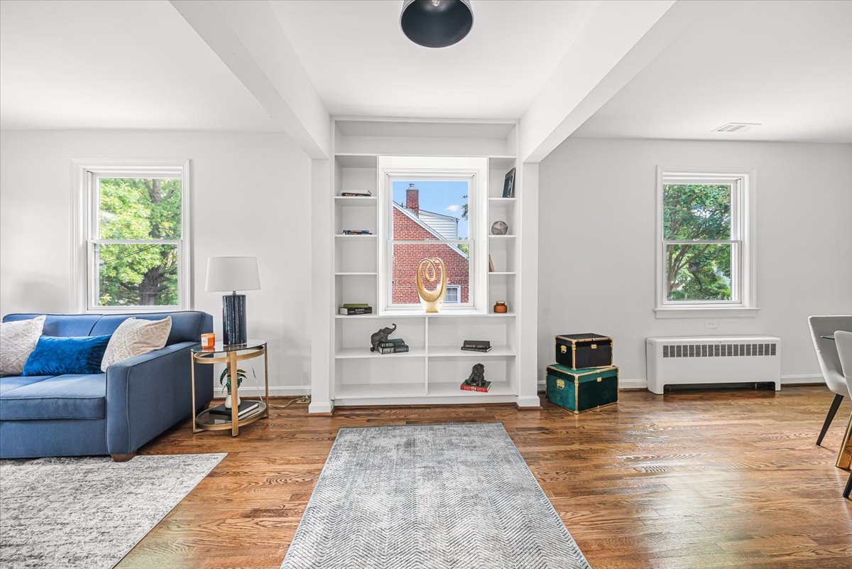 1902 Rookwood Road Silver Spring, MD 20910 - Photo 8 of 36 a living room with furniture and a large window