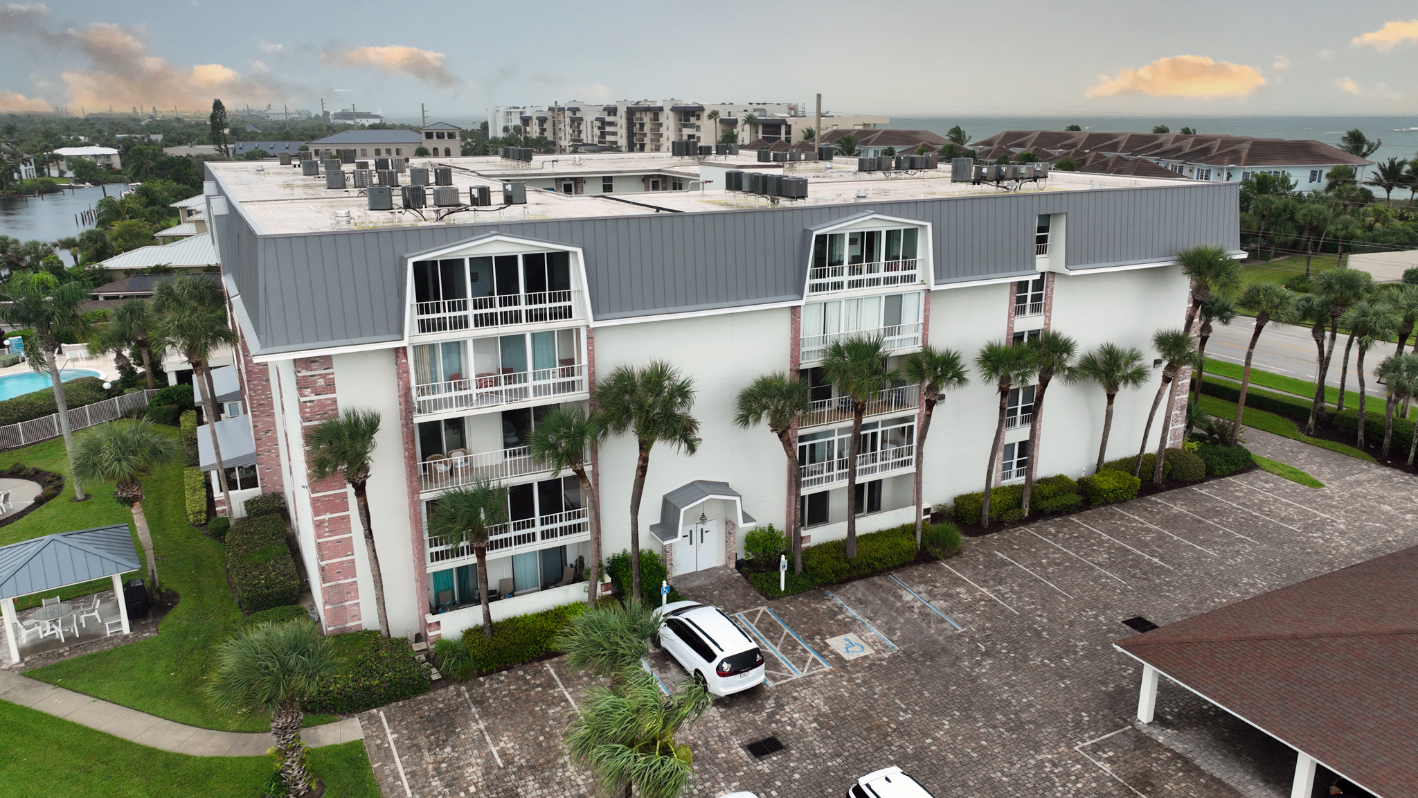 4601 Highway A1a, Unit 102 Vero Beach, FL 32963 - Photo 2 of 29 an aerial view of a house with backyard