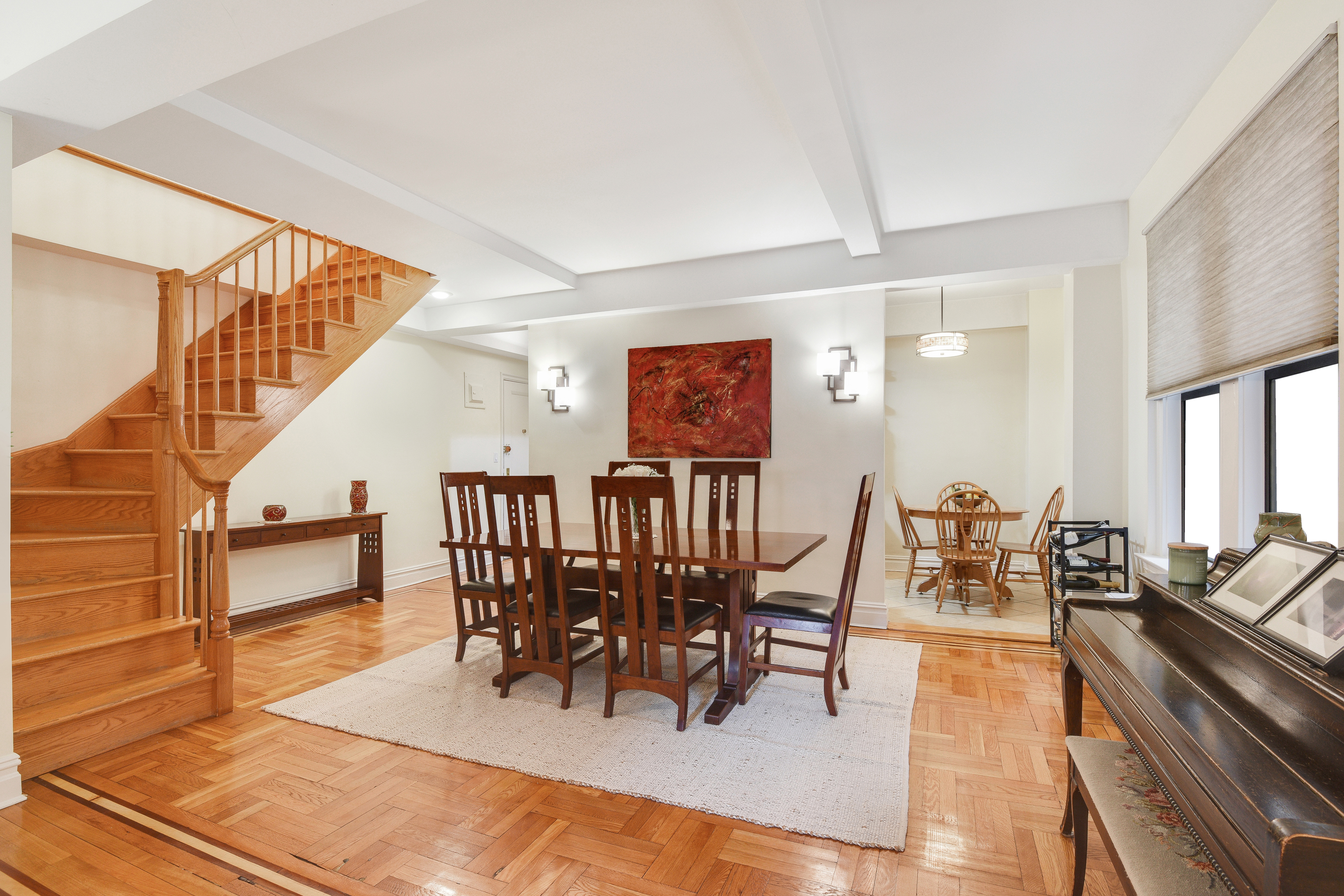 321 West 90th Street, Unit 2F/3F Manhattan, NY 10024 - Photo 4 of 15 a dining room with furniture entryway and wooden floor