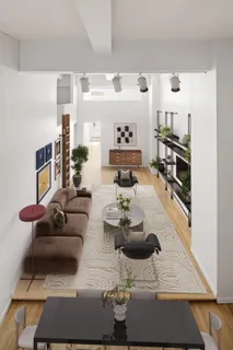 a living room with furniture and a rug