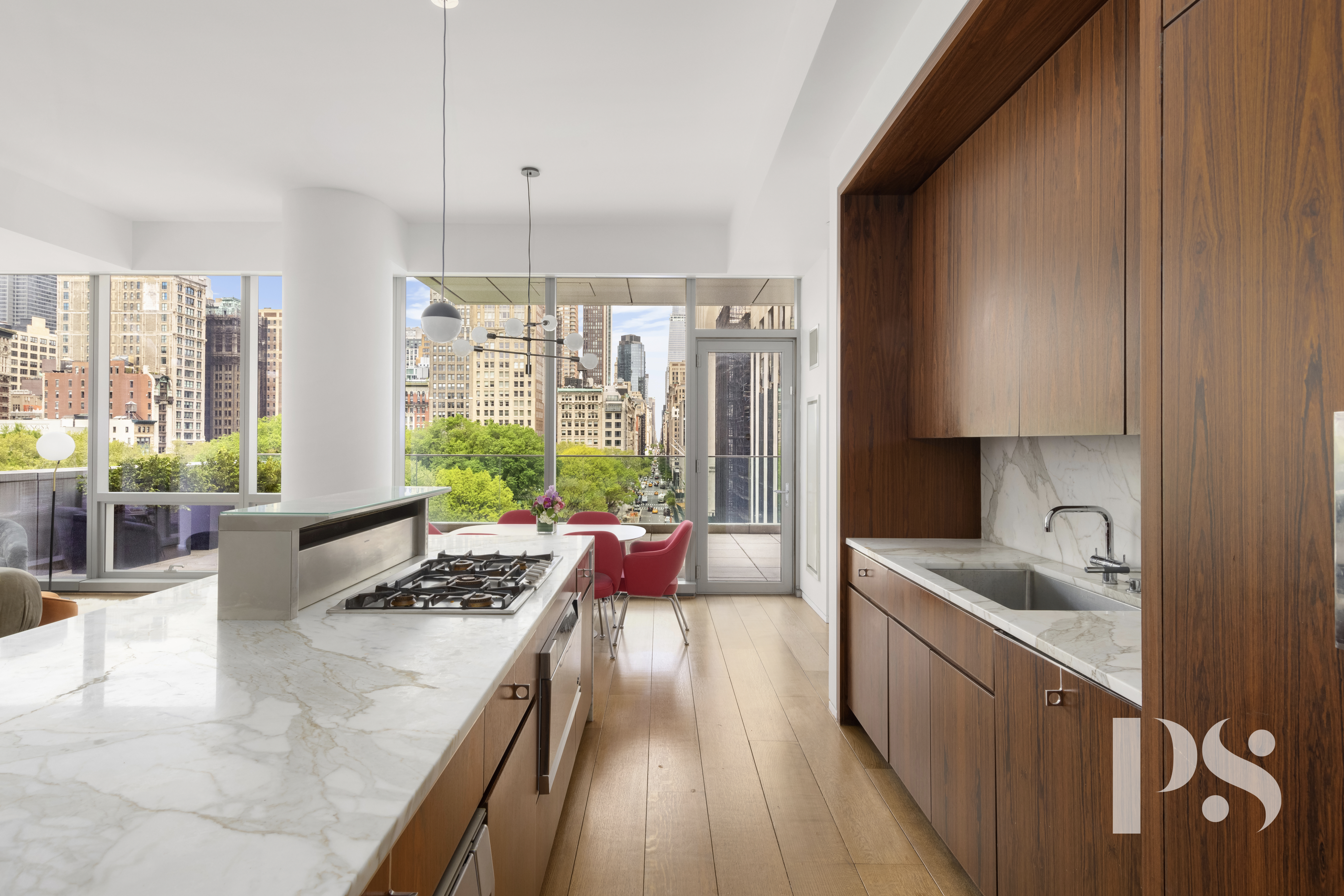 23 East 22nd Street, Unit 8A Manhattan, NY 10010 - Photo 5 of 25 a kitchen with sink refrigerator and window