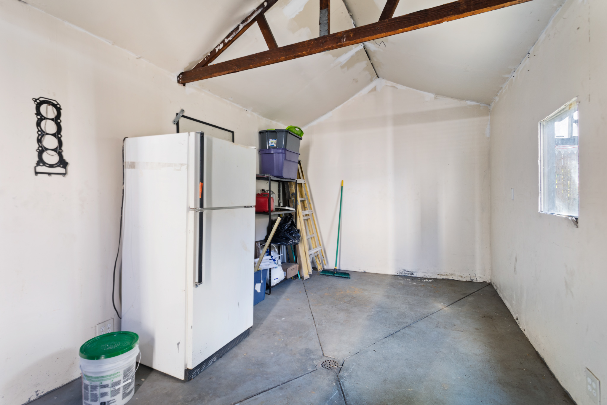 91-22 92nd Street Queens, NY 11421 - Photo 22 of 27 a view of storage and utility room with a hallway