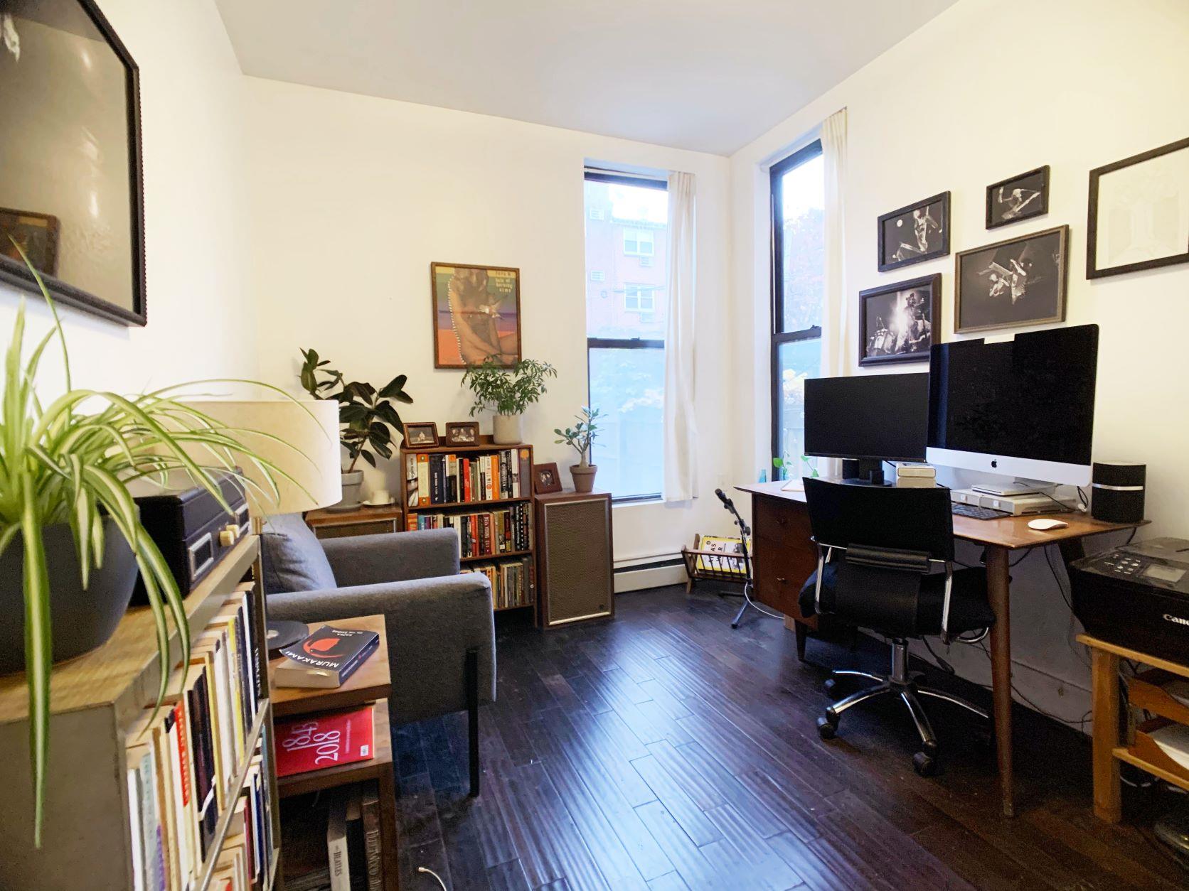 155 A 9th Street, Unit 1 Brooklyn, NY 11231 - Photo 8 of 15 a view of a livingroom with workspace and a couch