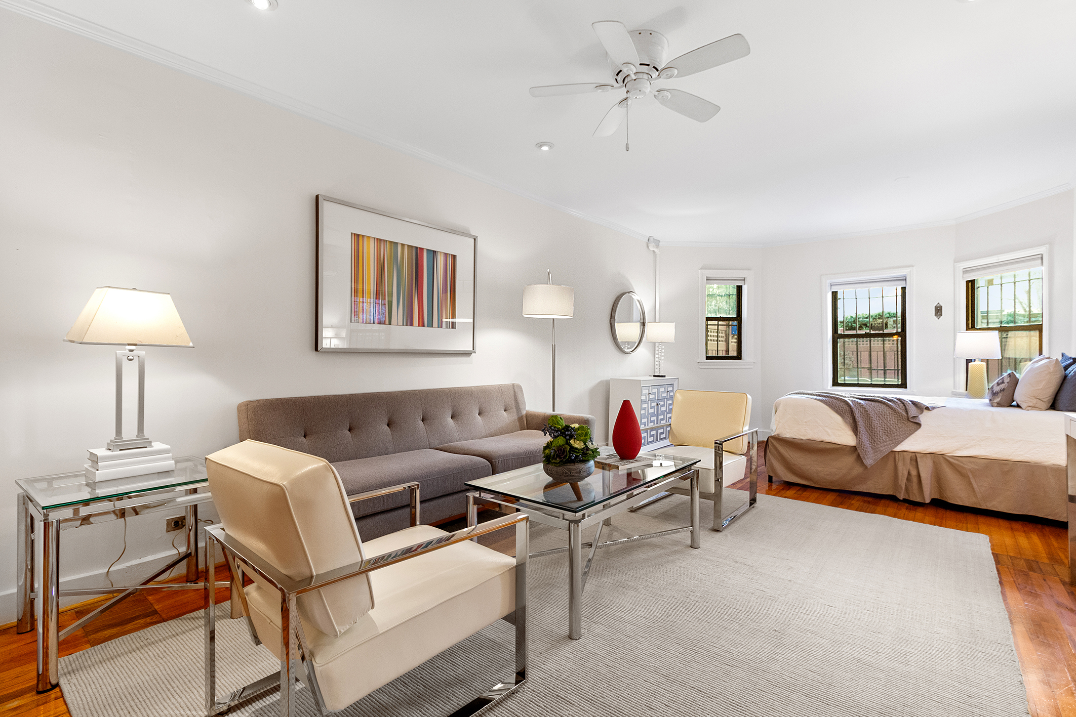 579 5th Street Brooklyn, NY 11215 - Photo 13 of 19 a living room with furniture and a lamp
