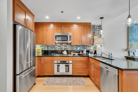 $965,000 | 21 Father Francis Gilday Street, Unit 110, Boston, MA 02118