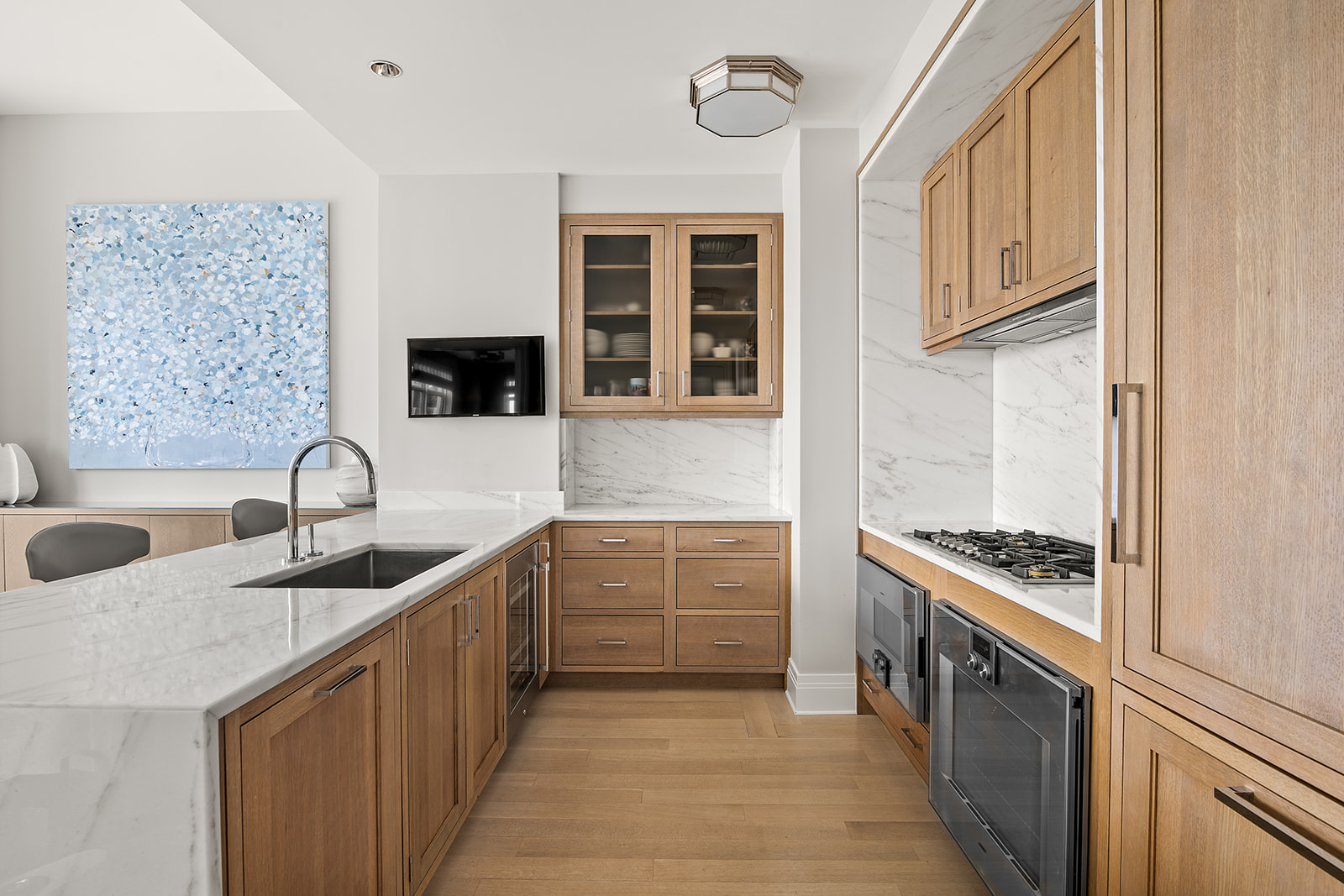 30 Park Place, Unit 43A Manhattan, NY 10007 - Photo 5 of 13 a kitchen with stainless steel appliances granite countertop a stove and a sink