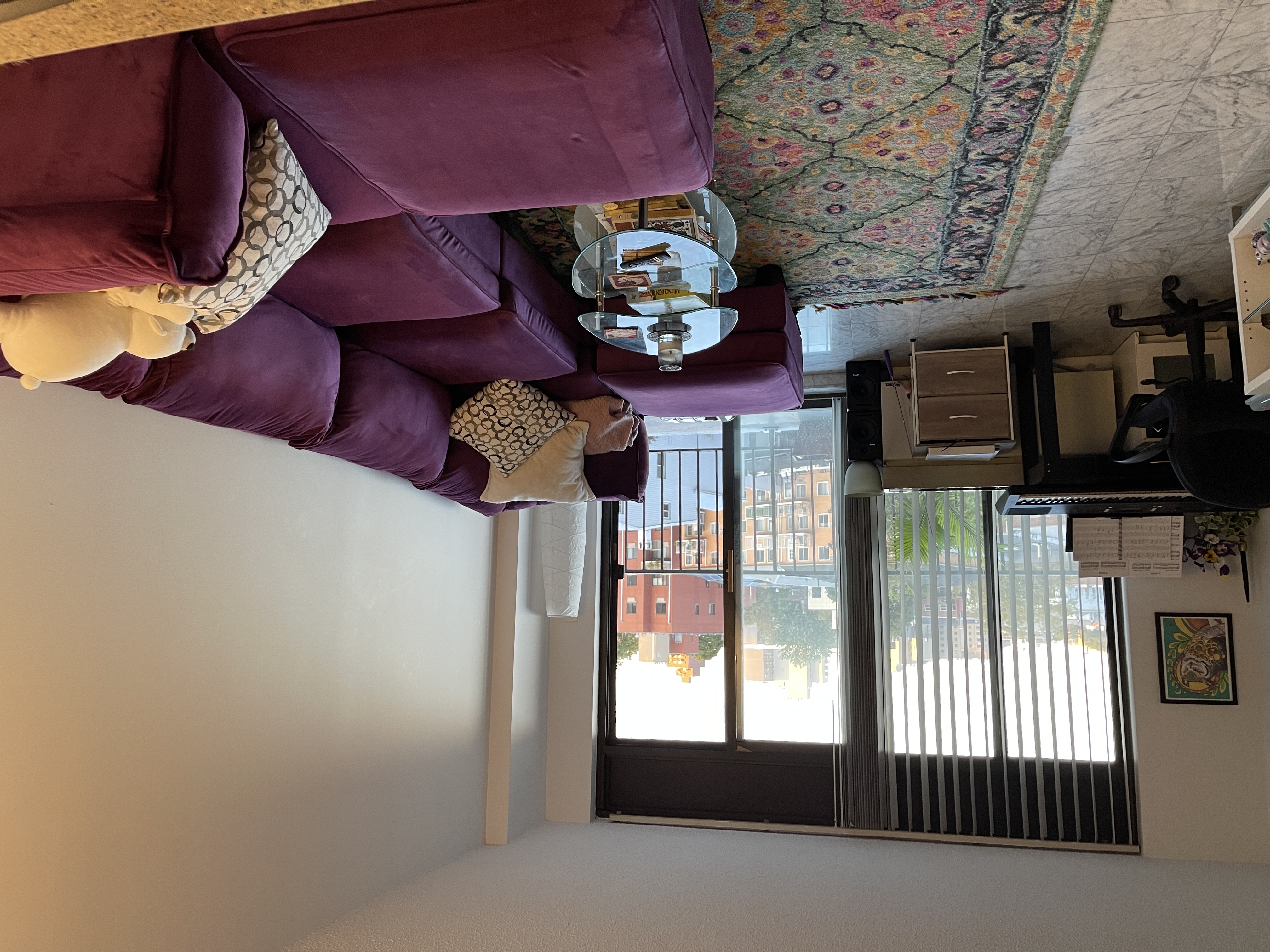 25-40 Shore Boulevard, Unit 5B Queens, NY 11102 - Photo 1 of 24 a living room with furniture and a large window