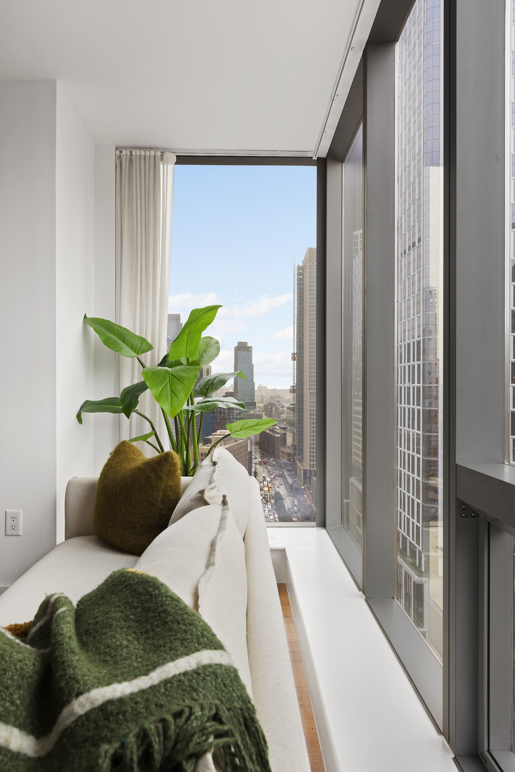 150 Myrtle Avenue, Unit 2506 Brooklyn, NY 11201 - Photo 8 of 16 a bedroom with a bed and a large window