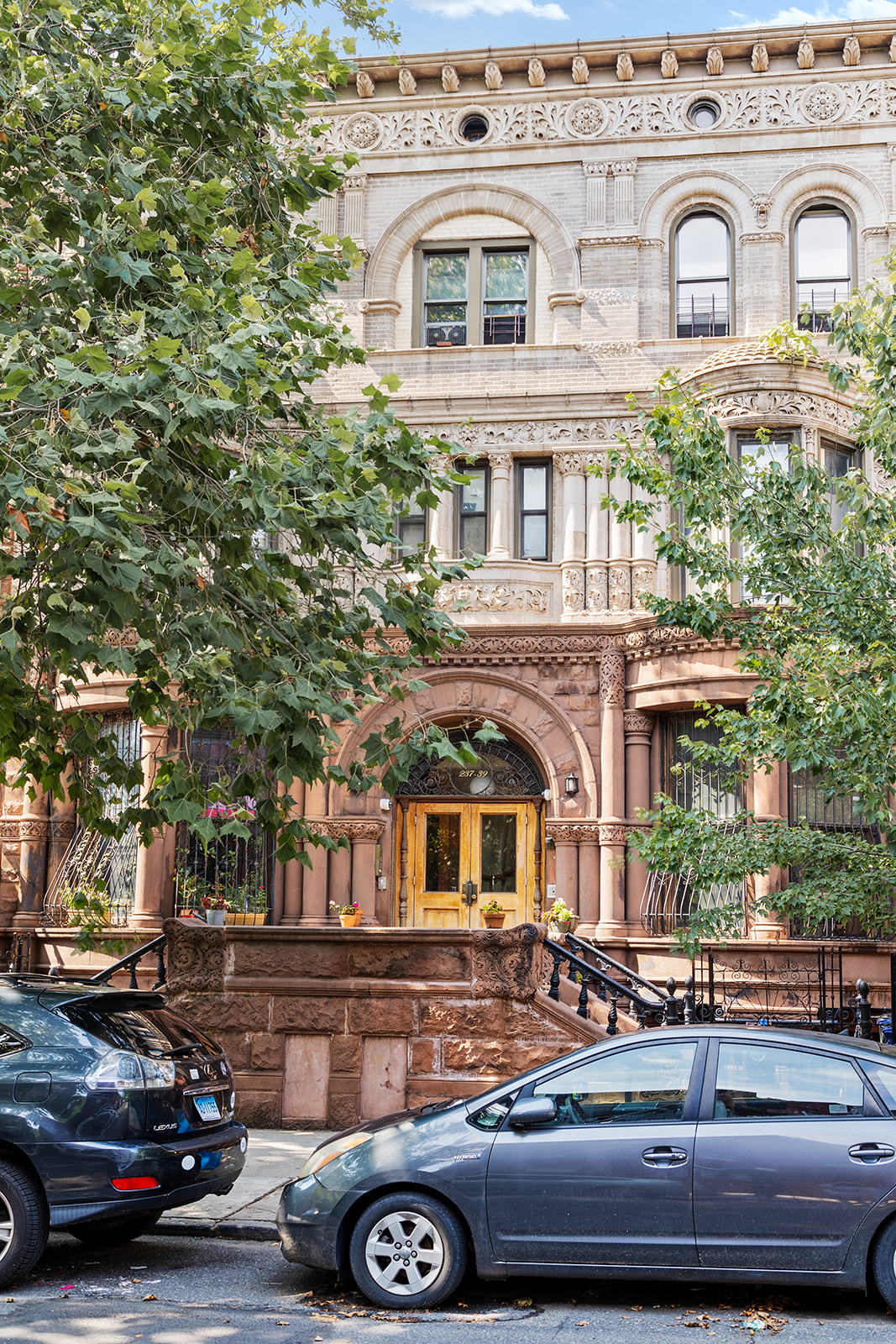 237 Hancock Street, Unit 13 Brooklyn, NY 11216 - Photo 6 of 7 a front view of a building with parking space