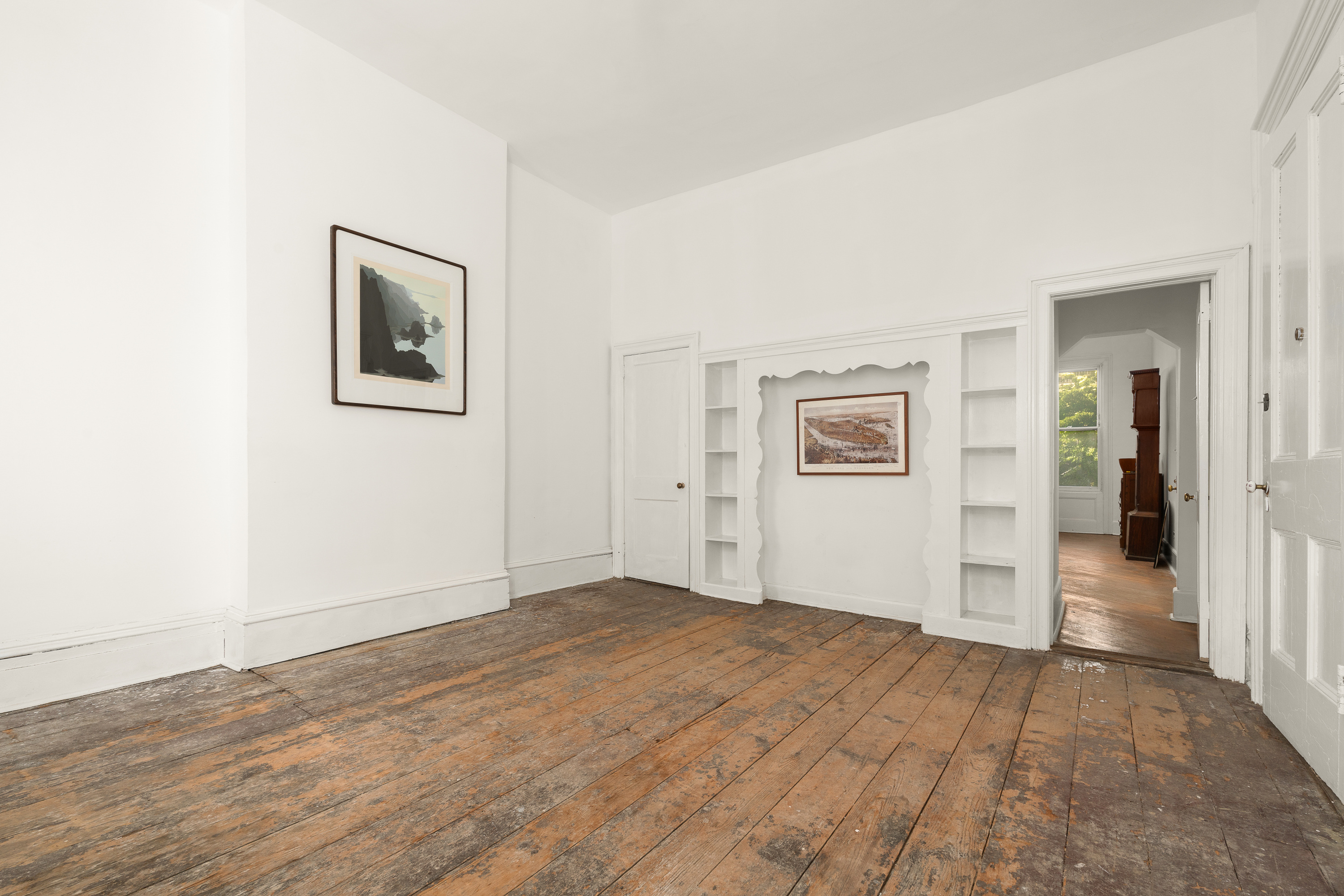 217 Dean Street Brooklyn, NY 11217 - Photo 4 of 26 a view of an empty room with wooden floor